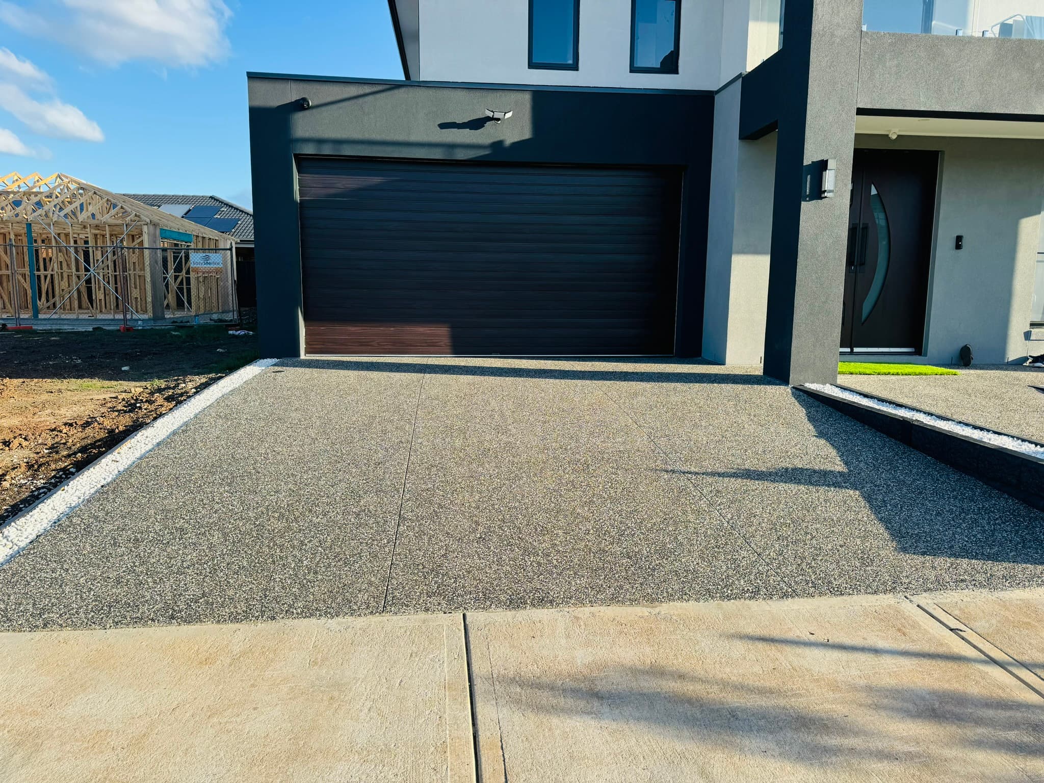 Exposed aggregate concrete driveway