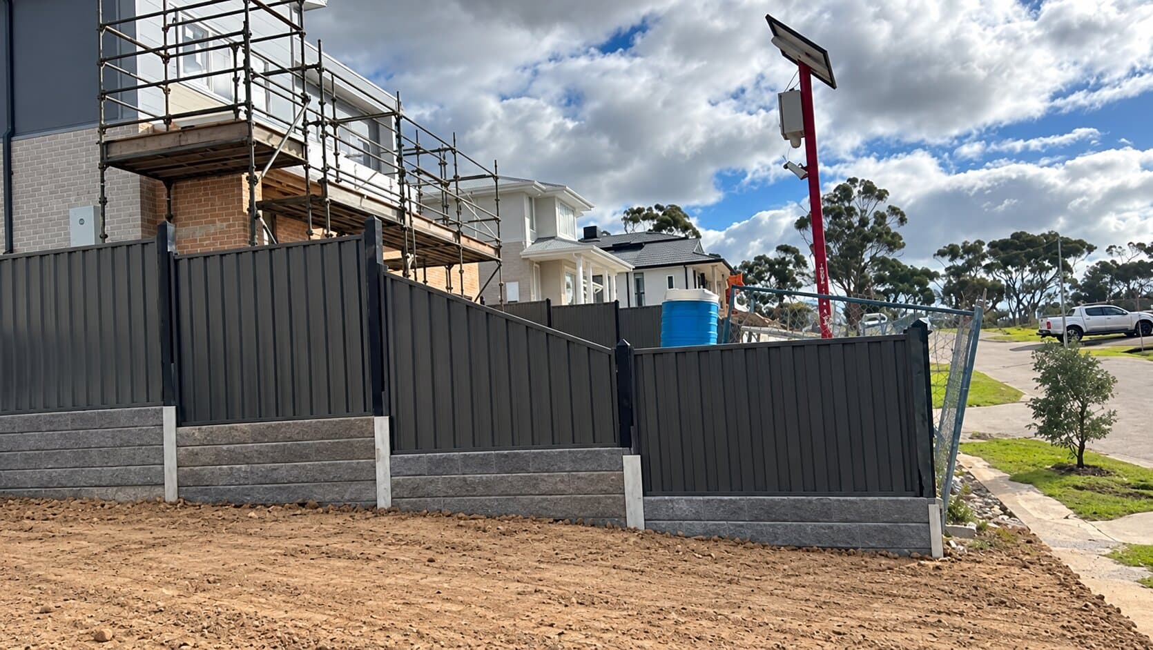 Retaining wall and fencing